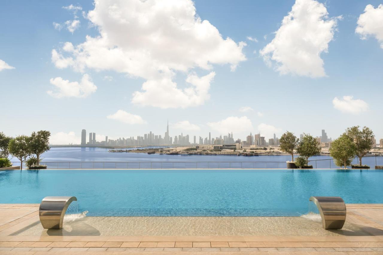 Готель Address Creek Harbour Дубай Екстер'єр фото View of Dubai from the pool